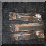 S05. Reed & Barton silverplate children's utensils. 